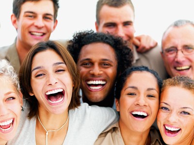 Multicultural group of adults laughing