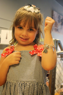 Girl wearing alex and ani braclet at JAF launch party